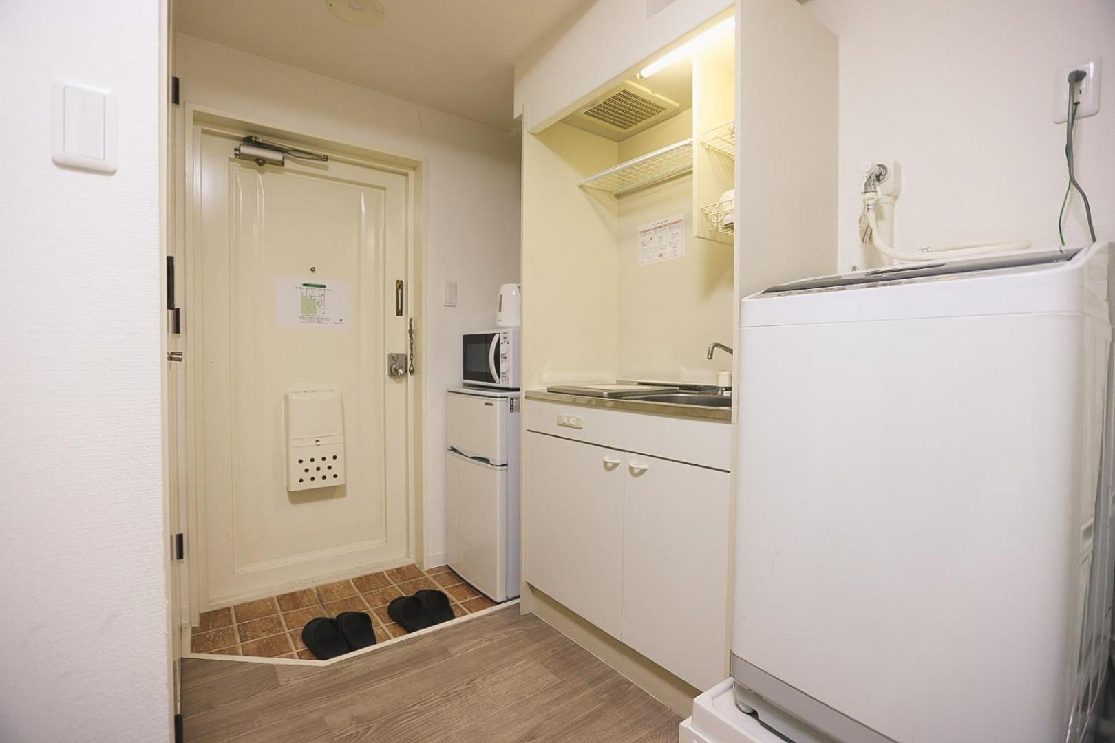 Tookin House 池袋 Tóquio Quarto foto