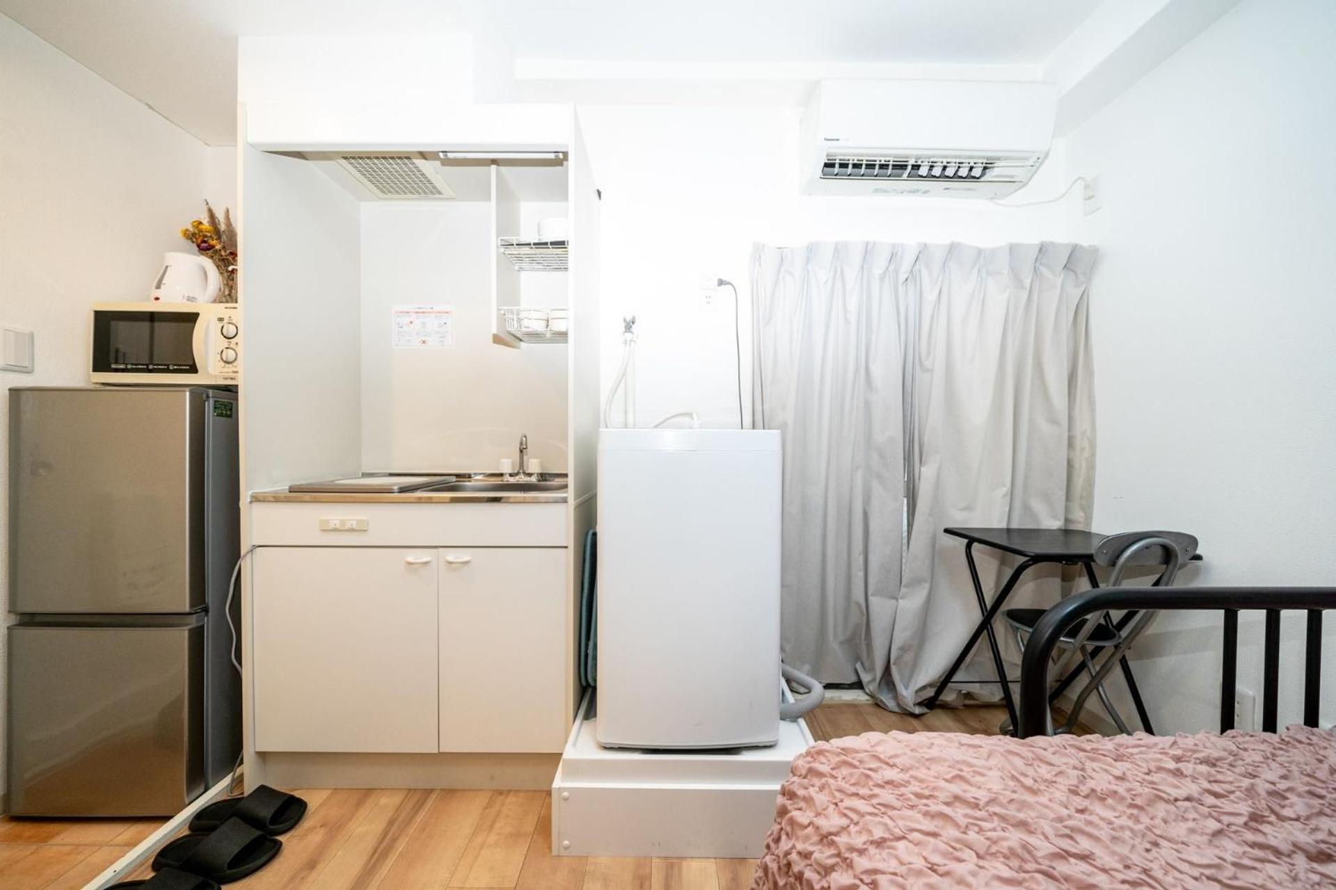Tookin House 池袋 Tóquio Quarto foto
